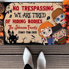 NO TRESPASSING WE'RE TIRED OF HIDING BODIES PERSONALIZED FAMILY DOOR MAT