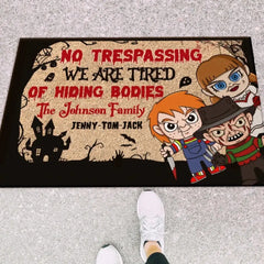 NO TRESPASSING WE'RE TIRED OF HIDING BODIES PERSONALIZED FAMILY DOOR MAT